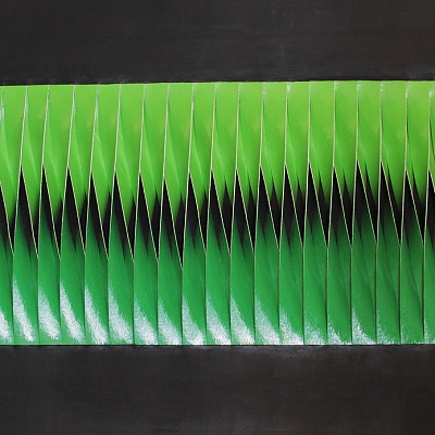 <em><strong>Oil Spill on grass</strong></em>, 2013<br/> Oil and gloss paint skin on cut and twisted canvas, 152 x 72 cm